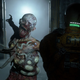 A zombie from The Callisto Protocol lurches toward a man who definitely isn't from Dead Space.